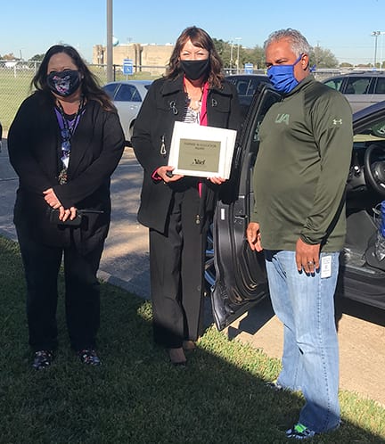 SterlingMcCall VIP Services Awards Christopher Cashin the Alief December Teacher of the Month